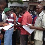 Legal consultation between migrant mineworker and LHR staff in Mozambique